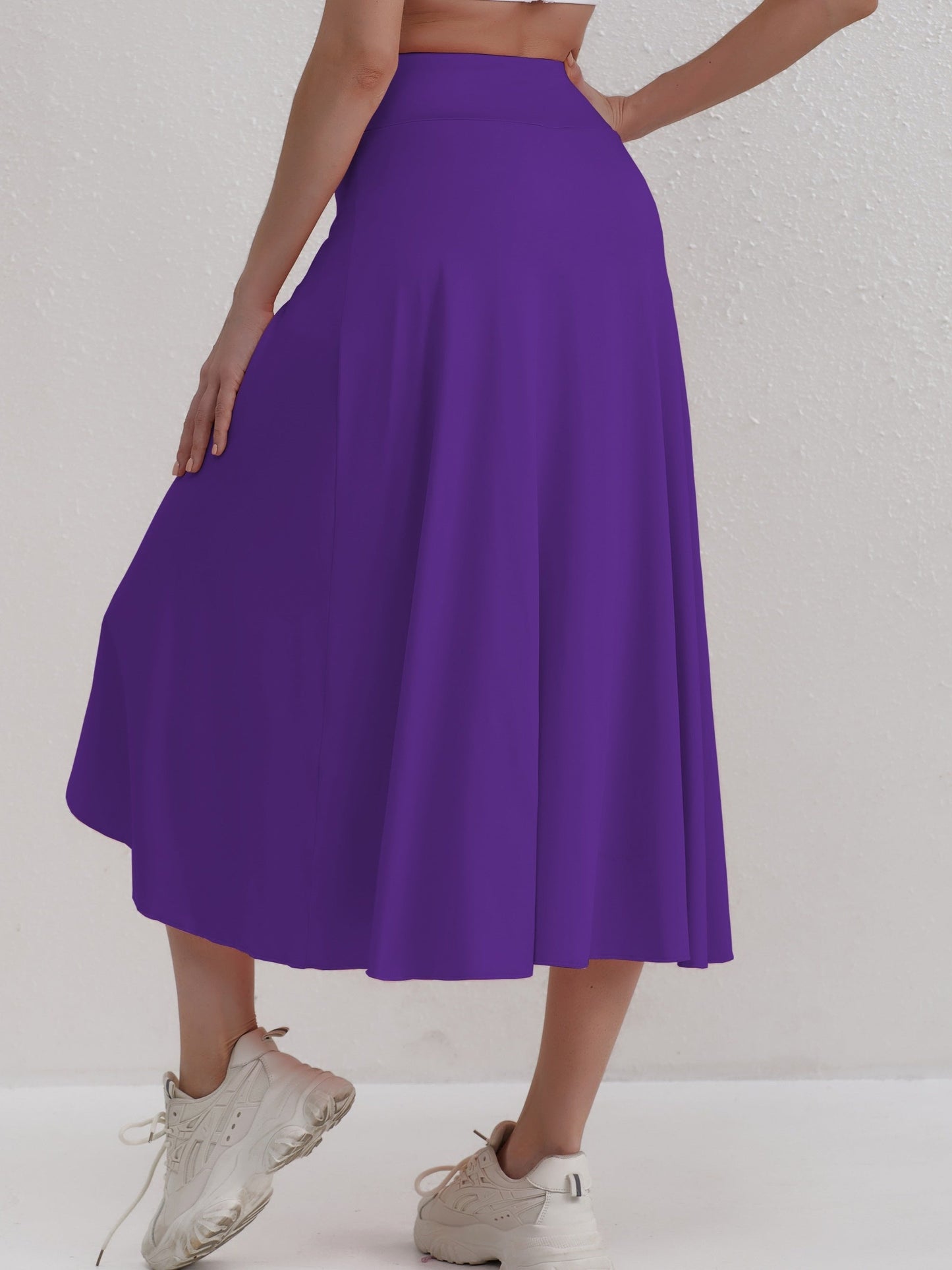 Sporty women's skirt with a high waistband & asymmetric cut – Alexia-Coral-S-Nora Luxe