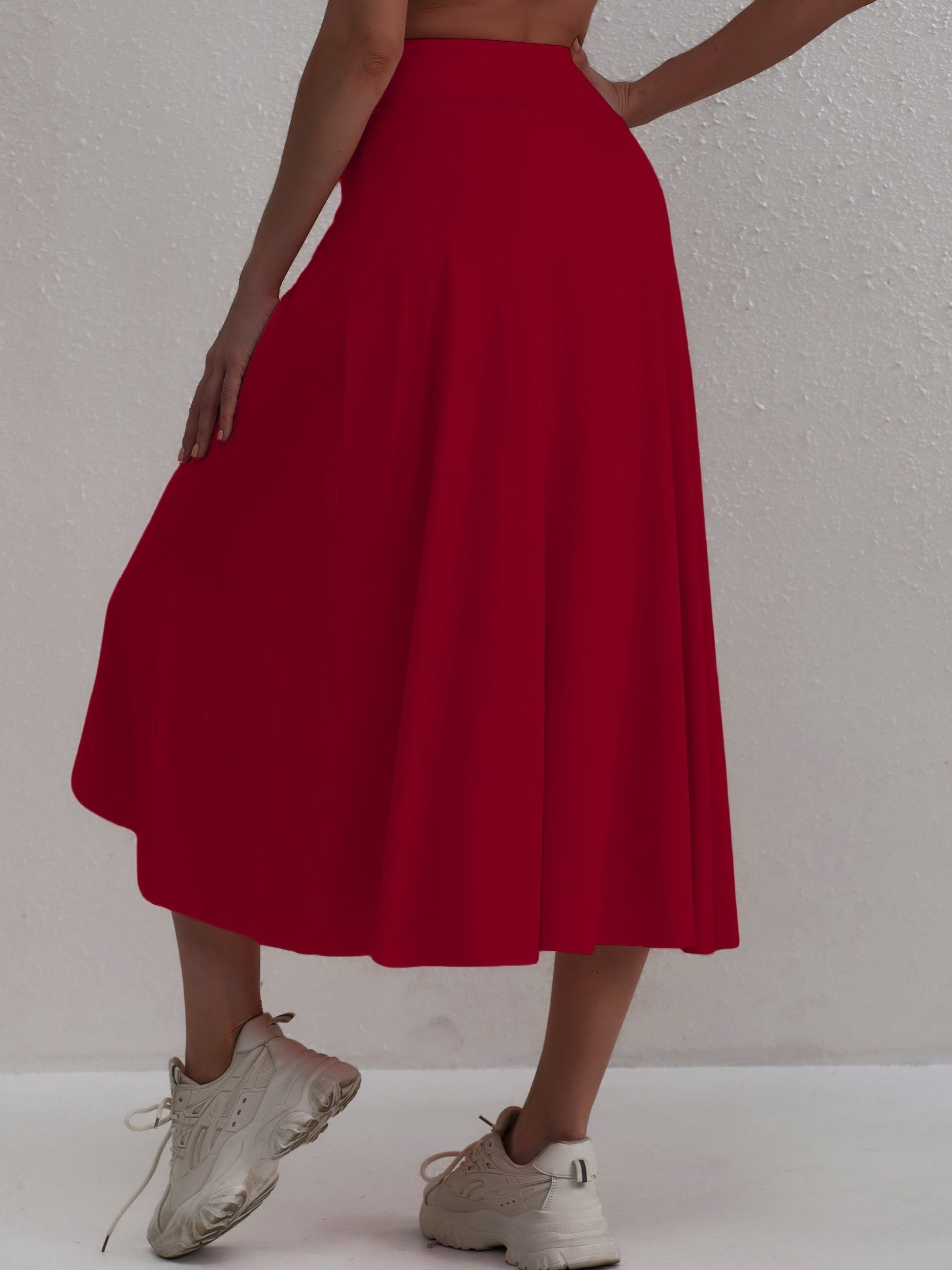 Sporty women's skirt with a high waistband & asymmetric cut – Alexia-Coral-S-Nora Luxe